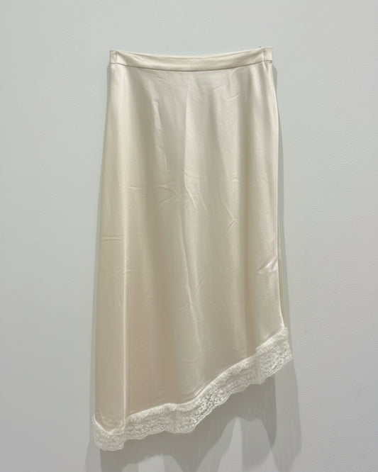 FALDA SATINADA ENCAJE ASIMETRICA BEIGE
